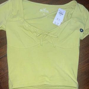 green Hollister never worn before. nothings wrong with, just didn’t like